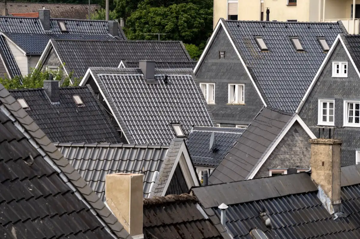 Steep roof eaves and gutter lines on houses in Aurora, IL